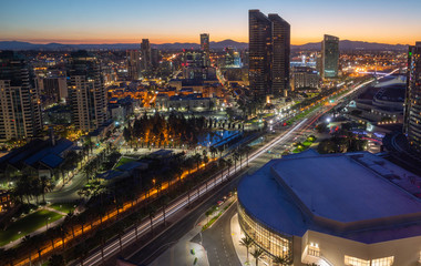 downtown San Diego California city lights skyline buildings at sunrise sunset