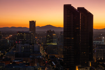 San Diego California city skyline and lights at sunrise sunset