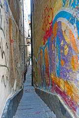 A colorful wall of graffiti graces an alleyway in Gamla Stan, Stockholm's old town