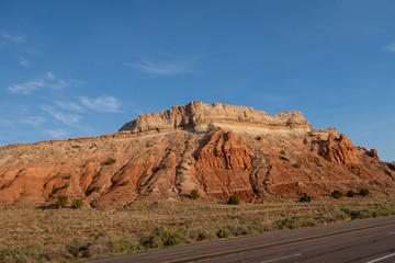 Landscape of road and colorful stone formations somewhere in New Mexico