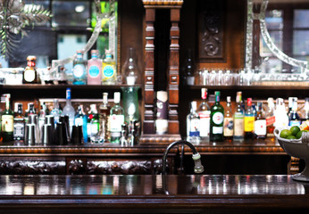 Wooden table blur bar alcohol background.