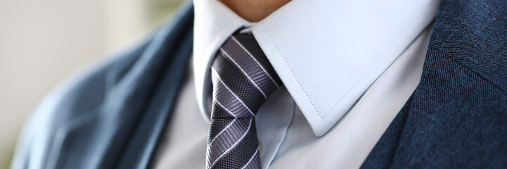 Male arm in blue suit set tie closeup. White collar management job serious move secretary student luxury formal interview executive agent marriage store corporate elegance employment preparation