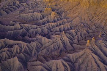 cinematic aerial view of desert badlands texture