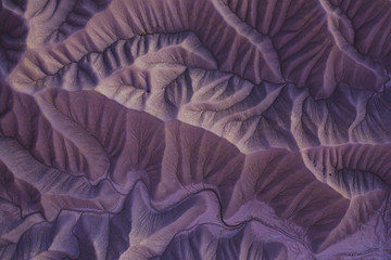aerial shot of striking vibrant exotic desert badlands