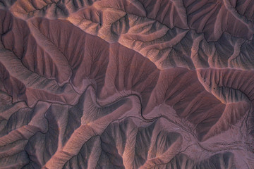 aerial photo of vibrant desert badlands texture