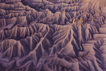 Aerial photo of abstract organic texture in stunning desert badlands landscape