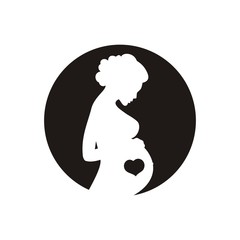 Elegant silhouette of a pregnant woman