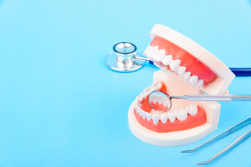 Dental Hygiene Health Concept, White tooth and Dentist tools for dental care