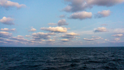 Naklejka na ściany i meble beautiful sea view and clouds take on ship