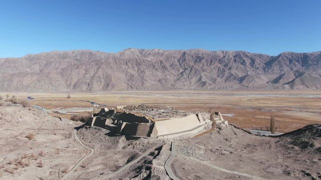 Aerial view of China Xinjiang Taxkorgan(Tashkurgan) Stone City. The Stone City Kashgar. Drone Shot Footage 4K (UHD).