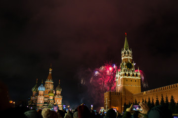 salute in honor of the new year 2020 on red square against the Kremlin, Spasskaya tower and St. Basil's Cathedral