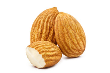 Close-up of tasty almonds, isolated on white