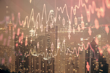 Double exposure of forex chart drawings over cityscape background. Concept of success.