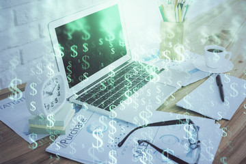 Stock market chart hologram drawn on personal computer background. Double exposure. Concept of investment.