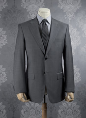 a suit jacket in a mannequin