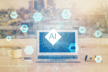 Double exposure of desktop computer and technology theme hologram. Concept of software development.