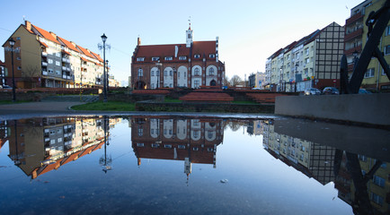 Kamień Pomorski, the old market square with the town hall building. - obrazy, fototapety, plakaty