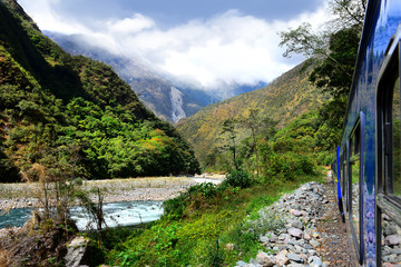 Fototapeta na wymiar Peruvian train to Machu Picchu and beautiful landscape
