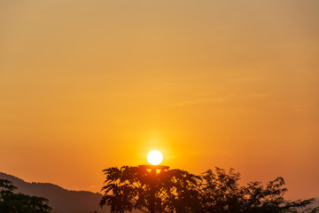 Scenic View Of Landscape Against Sky During Sunset
