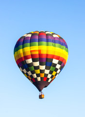 colorful hot air balloon against blue sky