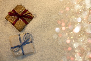 beautiful gift on a white background lies in Styrofoam balls with blasts