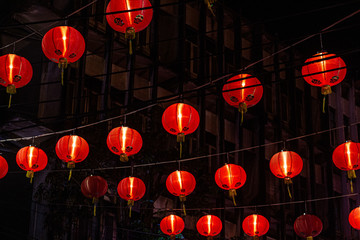 A Chinese red paper lantern at night