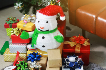 Snowman,gift box with ribbon, pine cone and Christmas tree decoration in Christmas ornament and New Year