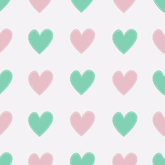Seamless pattern with pink and blue hearts. Vector illustration.
