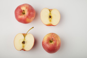 Ripe juicy red apples on white background