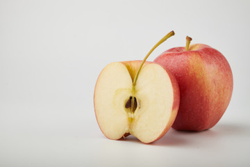 Ripe juicy red apples on white background