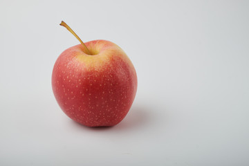 Ripe juicy red apples on white background