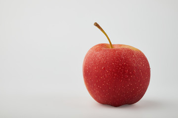 Ripe juicy red apples on white background