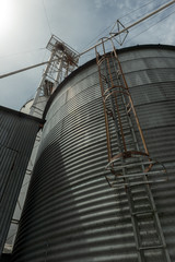 Naklejka premium Large Metal Bins at a Grain Elevator