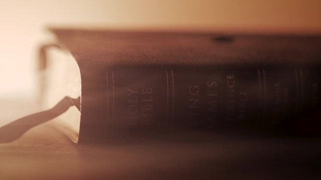 Holy Bible Close up. Old Testament. With smoke and shallow depth of field