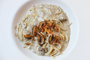 Black truffle spaghetti served on plate