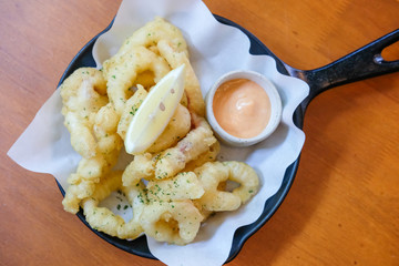 Close up of Fried Squid served on plate.
