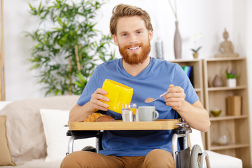 man eating a meal at the dining table