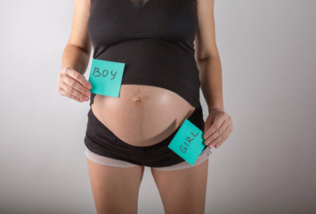 pregnant woman waiting for a boy or girl