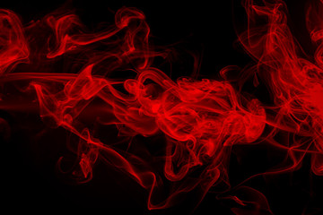 Red smoke on black background, dense smoke