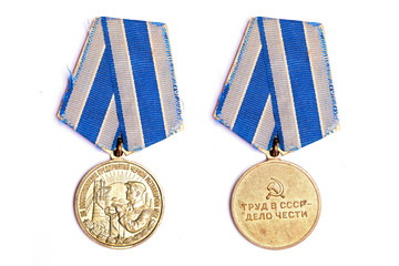Soviet medal "For the restoration of ferrous metallurgy enterprises in the south of USSR" on white background