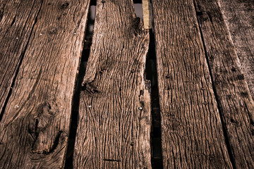 Vintage wood background and wallpaper. Rustic wooden wall texture. Old plank ancient pattern. Antique top table. Textured wooden board for rustic floor, fence or old bridge concepts.
