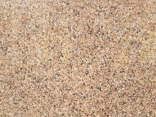 Fiberboard. Compressed light brown wooden plywood texture. Close up surface of pressed wood-shaving plate. Old wooden board bagasse background. Prefabricated plate made of sawdust