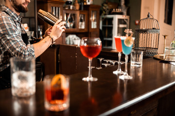 Bartender is mixing a summer cocktail