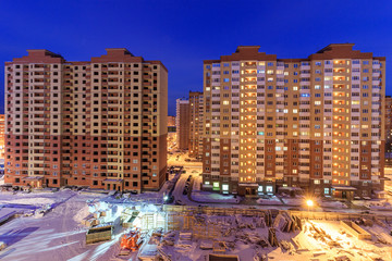 House construction and crane Proletarskay street in Zheleznodorozhny town in Moscow Oblast, Russia....