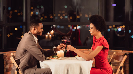 Happy Spouses Clinking Glasses During Romantic Dinner In Restaurant, Panorama