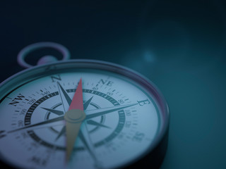 Vintage compass isolated on blue background. 3D