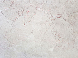 The plate is made of marble in black and white shades with a red streaks. Smooth texture for design and decoration. Natural building material. Natural patterns on the stone. Plates for floor and walls
