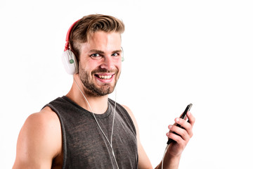 Listen music for motivation and inspiration. Audio quality. Inspiring music concept. Man handsome...