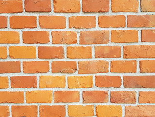 Background brick footbridge. Natural texture. Texture of a fragment of a wall of an old structure. A background for design and creative work. Decoration and exterior decoration. Masonry made of smooth