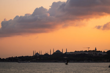 Fototapeta na wymiar Silhouette of Istanbul with Clouds at sunset